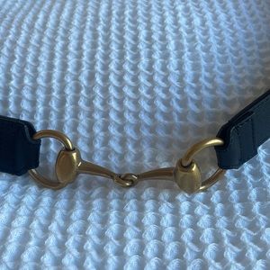 Gucci black leather belt with gold detailing